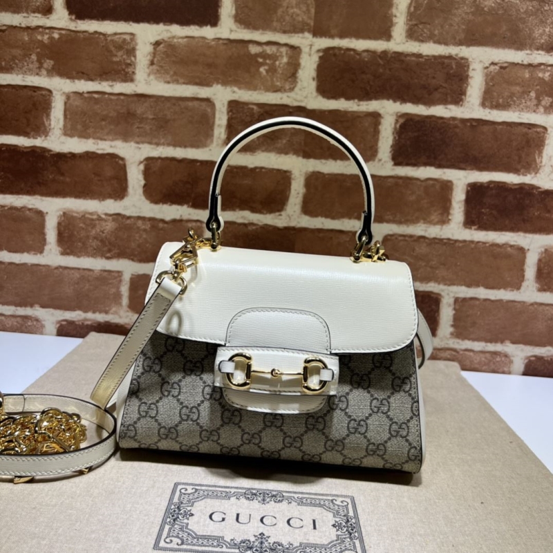 G*u*i top handle bags